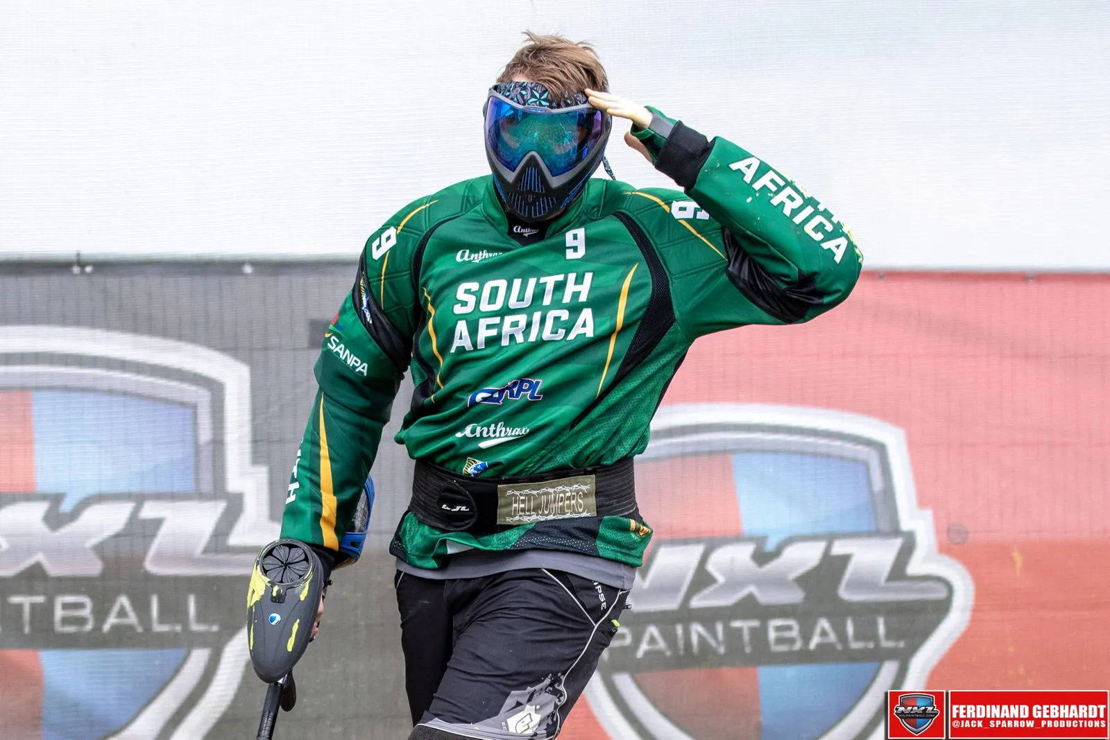 A South African player in the green national jersey saluting on the field at the 2018 Men's World Cup