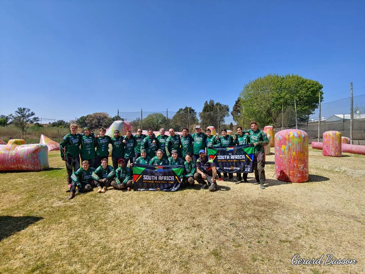 The South African national paintball teams and staff gathered together on a paintball field before leaving for Amsterdam