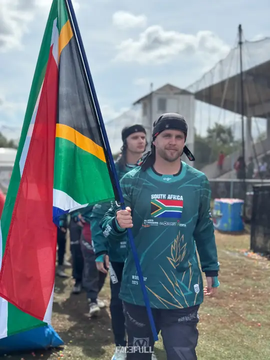 South African flag bearer walking onto the field