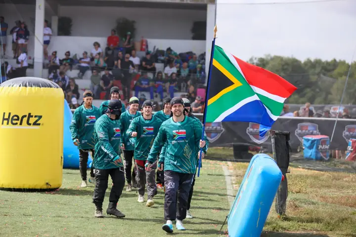 South African team walking onto the field behind the flag