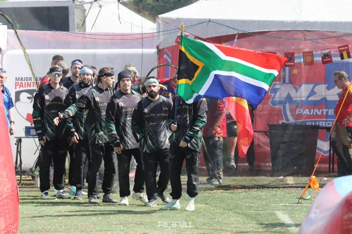 South African team walking out together behind the flag