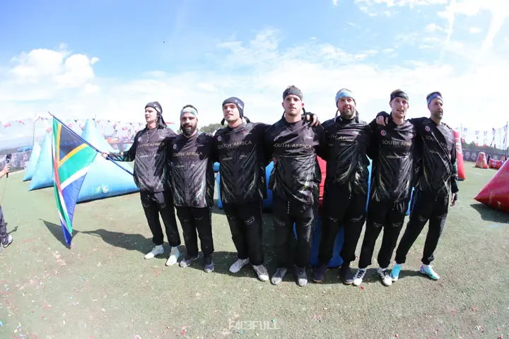 South African team standing arm in arm in a line